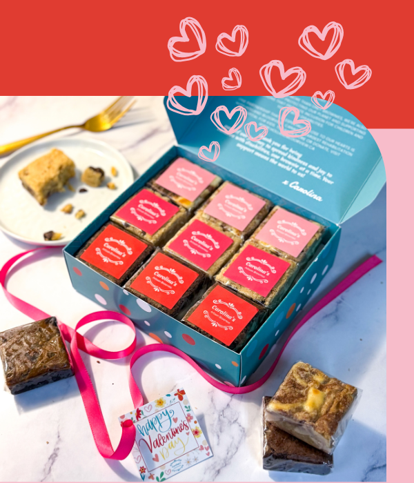 BLUE BOX WITH BROWNIES WITH PINK LABELS AND HEARTS FOR VALENTINES DAY